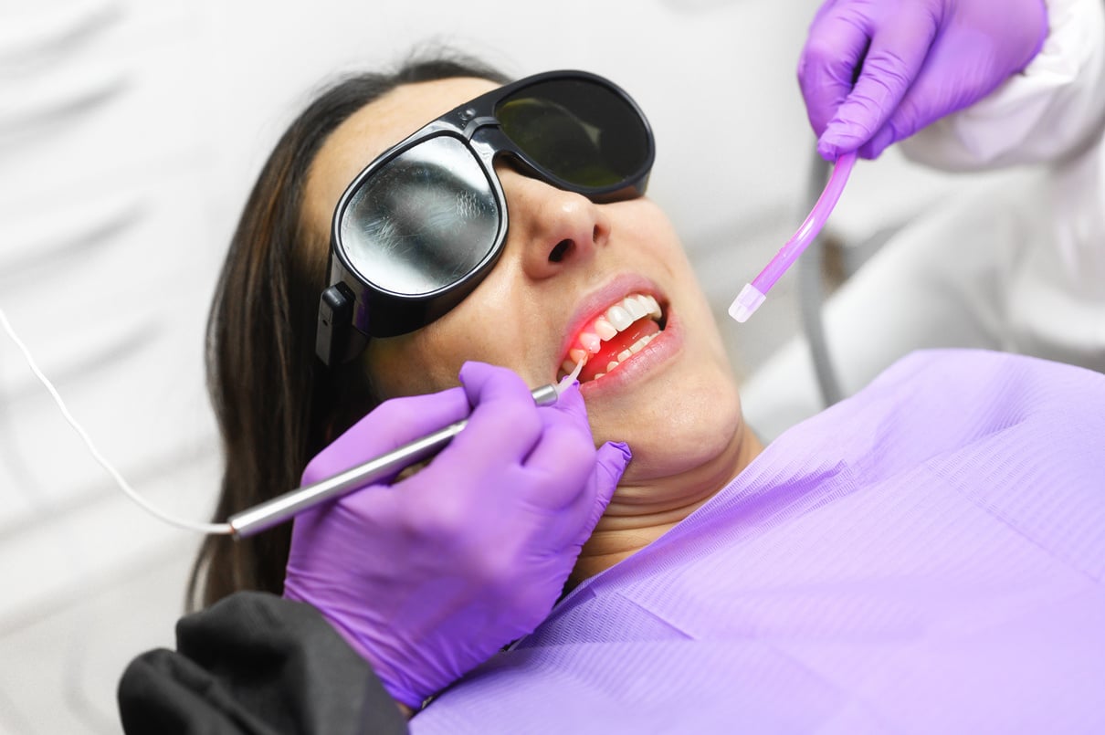 Dentist Using a Modern Diode Dental Laser